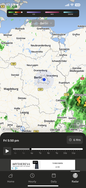 Weather radar map centered on Berlin with surrounding cities in northeastern Germany and western Poland. Map shows precipitation types (rain, ice, mix, snow) with some green patches indicating light rain in surrounding areas. Time shown is Friday 5:50 PM with a timeline slider for viewing forecast over the next 6 hours.